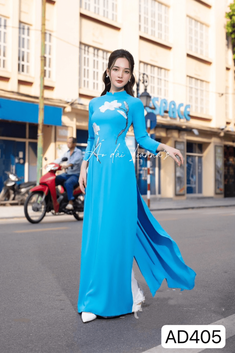 Mẫu áo dài Việt Tacpa áo xanh thêu, quần hồng