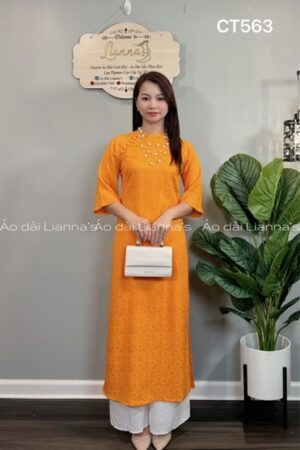Áo dài suong gấm hoa cúc cam