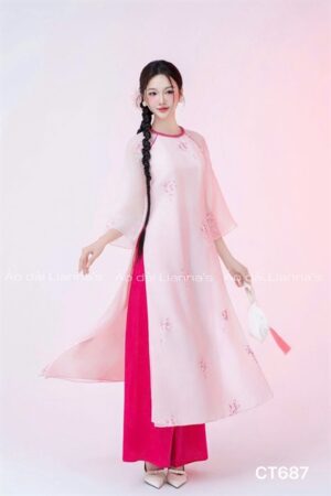 Áo dài cách Tân suông theu hoa tông Hồng cổ thắt bím