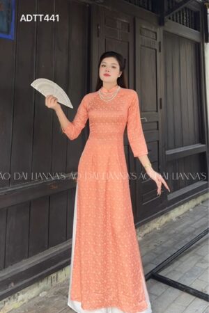 Áo dài truyền thống cam hoạ tiết chuồng chuồng