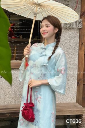 Áo dài xanh dương hoa Xuân