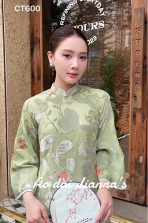 Áo dài cách tan suong xanh cốm họa tiet nhung