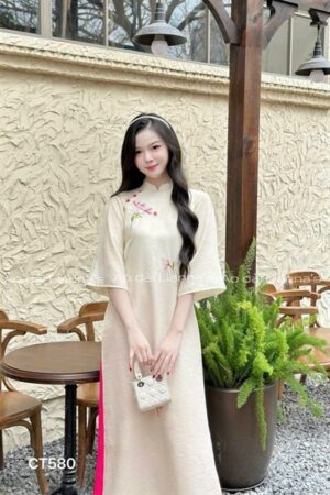Áo dài cách tan mau be vàng theu hoa quan hong sen kiotviet 0253770d536e15c1d1ae483a13d0cbfa