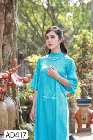 Áo dài form suông gấm tơ xanh dương