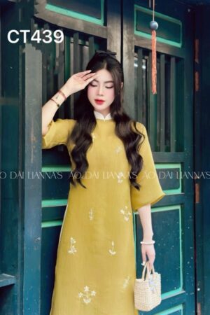 Áo dài cach tan suong theu hoa _vàng gold kiotviet 2c546ad17a3d2d13c51a590fa9fd5ae9