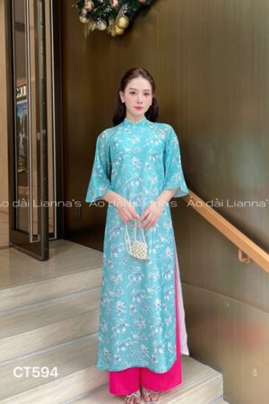 Áo dài cách tan tơ hoa xanh quan hong sen