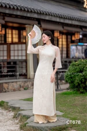 Áo dài cách Tân tơ hoa thêu tong mau kem kiotviet 7f650d386d388f39dc1c55a82fe6ce19