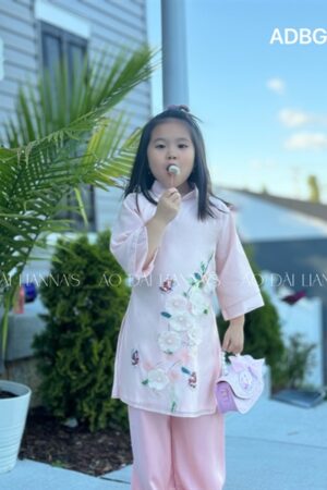 Ao dai bé gai tơ ket hoa nude hồng
