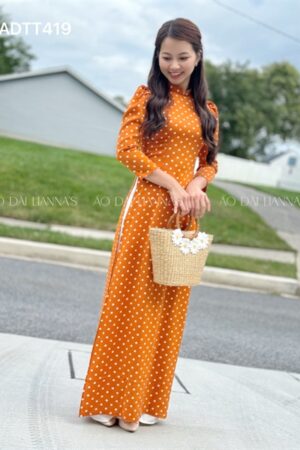 Ao dài chấm bi cam đất