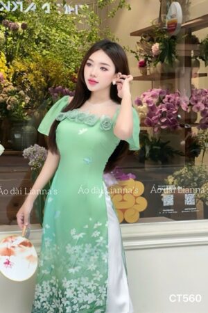 Áo dài cách tan xanh lá hoa kết nguc tay canh tiên kiotviet 2ba2e0e944359992e65f0eee687a184e
