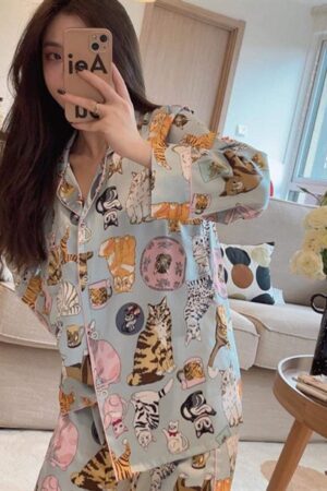 Mèo vàng nền xanh