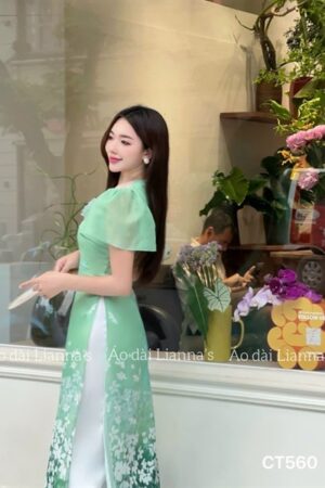Áo dài cách tan xanh lá hoa kết nguc tay canh tiên kiotviet 92e45b7884e03695be5f608572c141a2