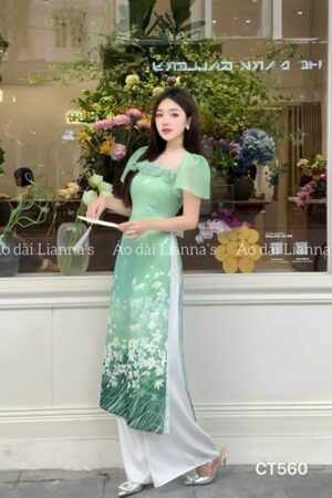 Áo dài cách tan xanh lá hoa kết nguc tay canh tiên kiotviet 97768b21d0cd1028ceea63a9072436ee