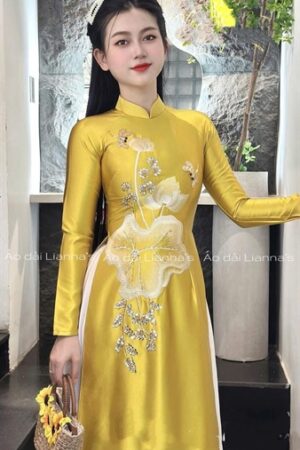 Áo dài thiết kế vàng gold theu sen