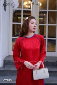 Áo dài đỏ phối xanh