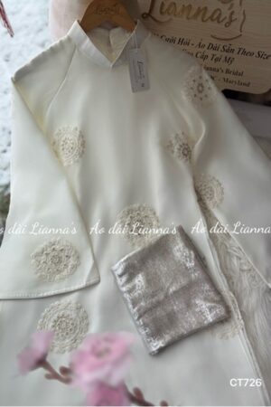 Áo dài trắng sữa hoa tiet thêu tròn kiotviet 288265c1ea22e9d656ad745a9957ef2d