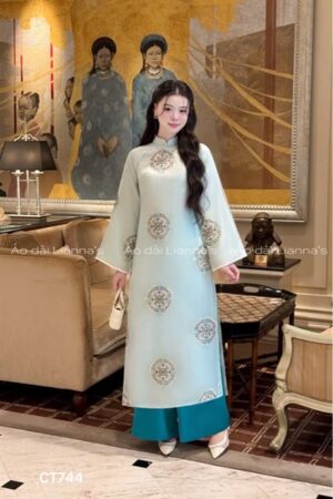 Áo dài suông ren thêu tròn tông xanh Ngọc