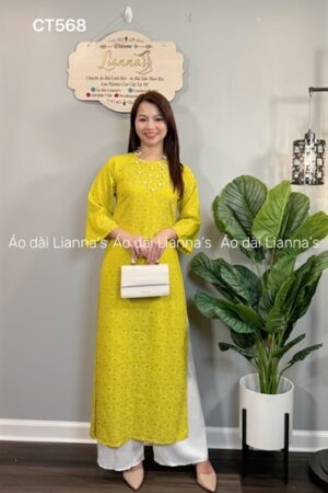 Áo dài suong gam hoa cúc vàng chanh