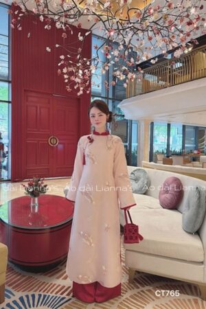 Áo dài cách tân hồng thêu viền đỏ