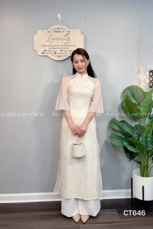 Áo dài cách tan nơ kem viền Hồng