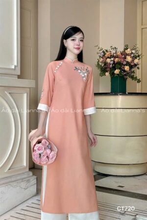 Áo dài cách tan Linen theu hoa tong cam sữa
