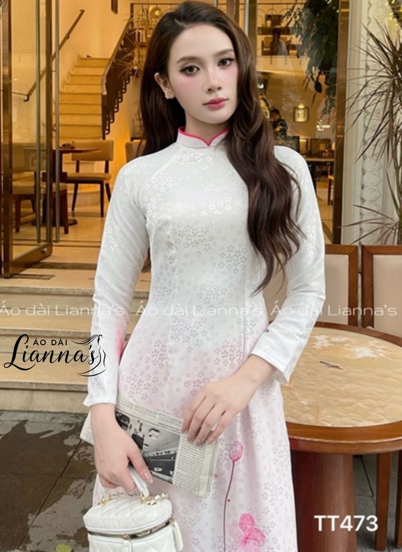 Áo dài trắng thêu hoa sen