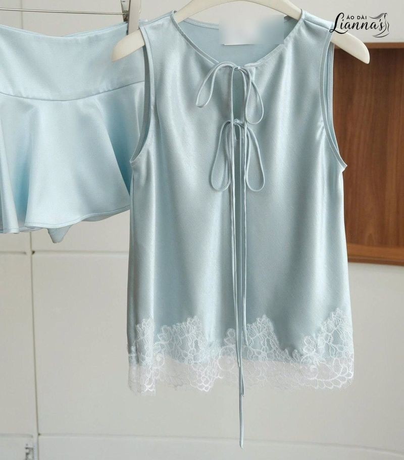 Đầm satin phối ren màu xanh pastel viền ren trắng